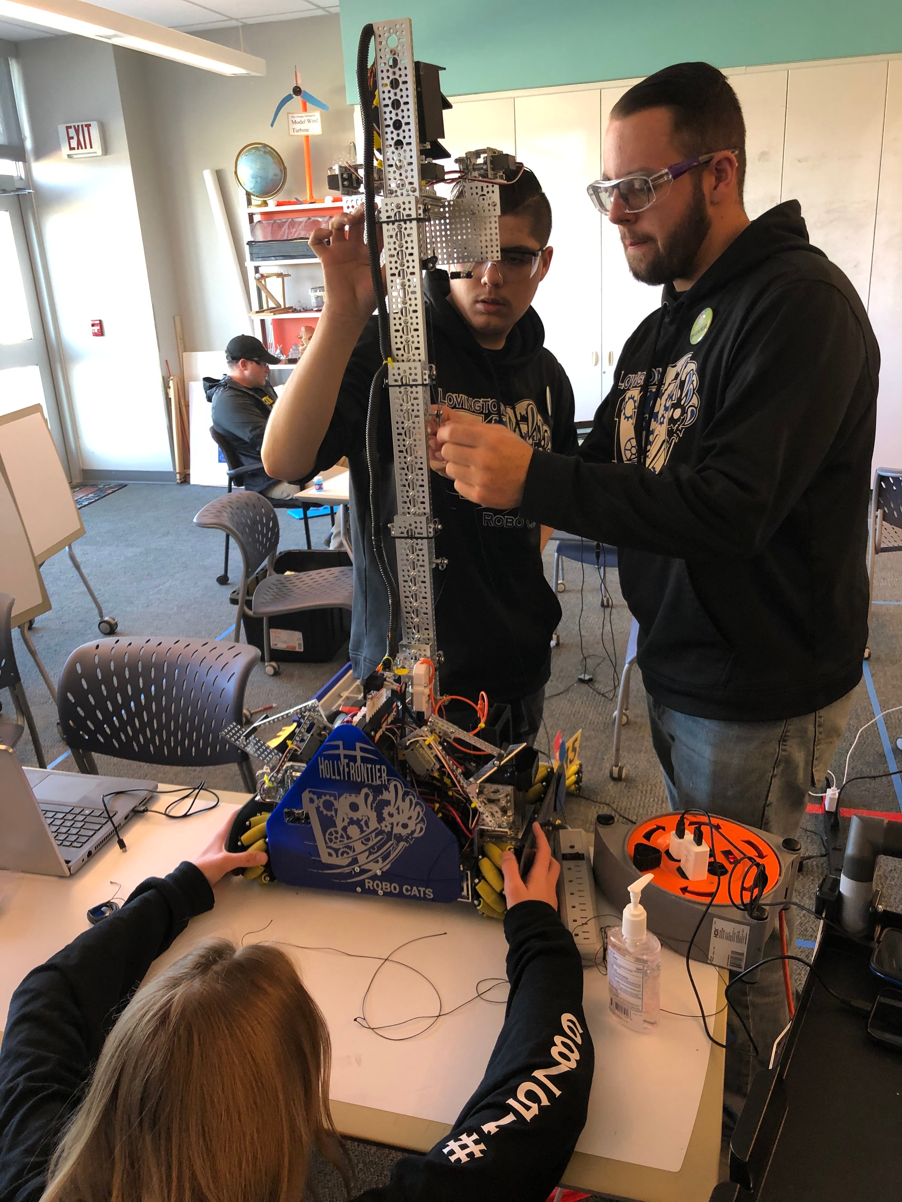 Members of Lovington Municipal School’s robotics team seen hard at work on their robots before COVID-19 hit. HollyFrontier began its STEM partnership with Lovington schools in 2014.