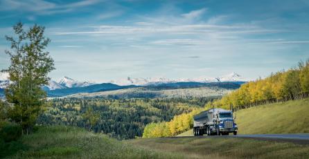 Fuel truck driving on mountain road